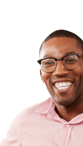 guy in salmon collard shirt smiling with glasses 
