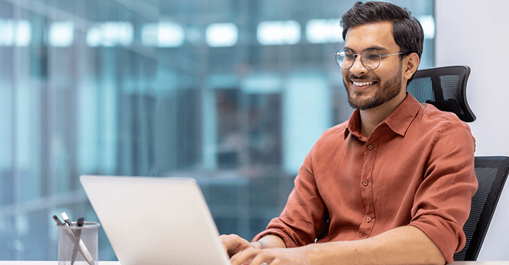 Employees benefiting from vision care coverage, supporting comfort, focus, and workplace productivity